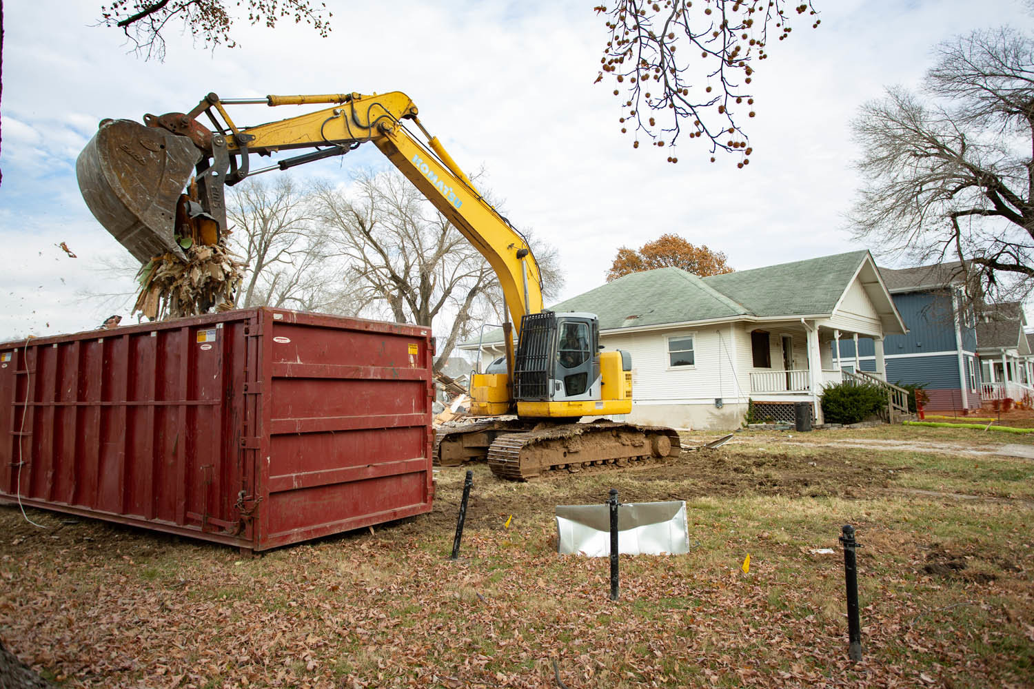 Several houses on East Cherry Street are being demolished to accommodate a residential development.